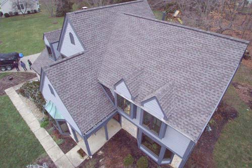 Aerial view of gray shingled home