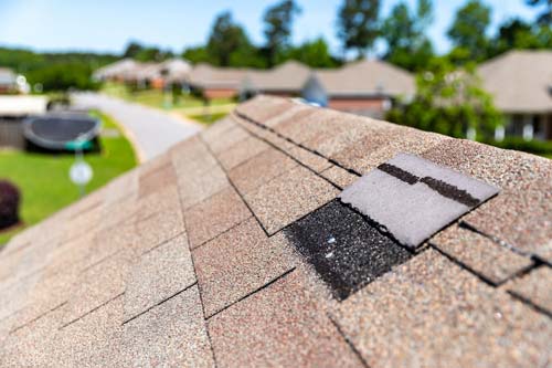 Wind damanged shingle